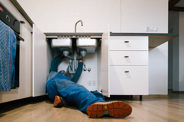 Professional Emergency Plumber technician working in Strathmore, NJ